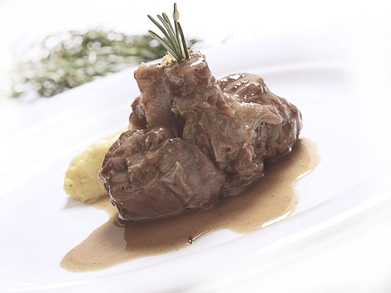 Ossobuco Milanese served with saffron risotto